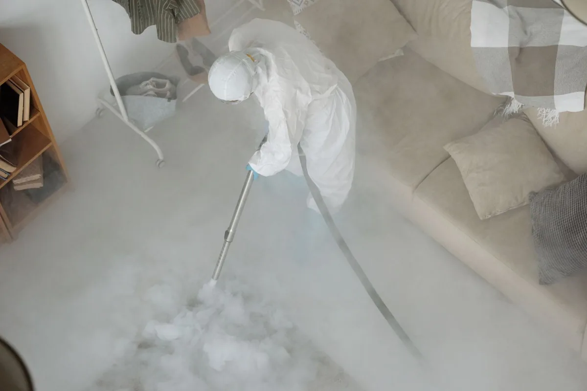 Biohazard cleanup technician in protective equipment, Woodlands, CA